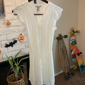 H&M women’s white mini dress with tie and detailed ribbing